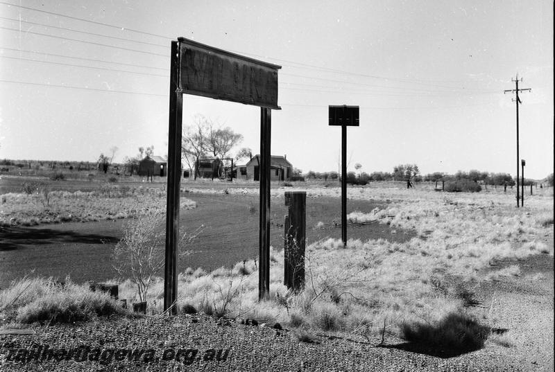 P12759
Nameboard, Wiluna, NR line, dilapidated.
