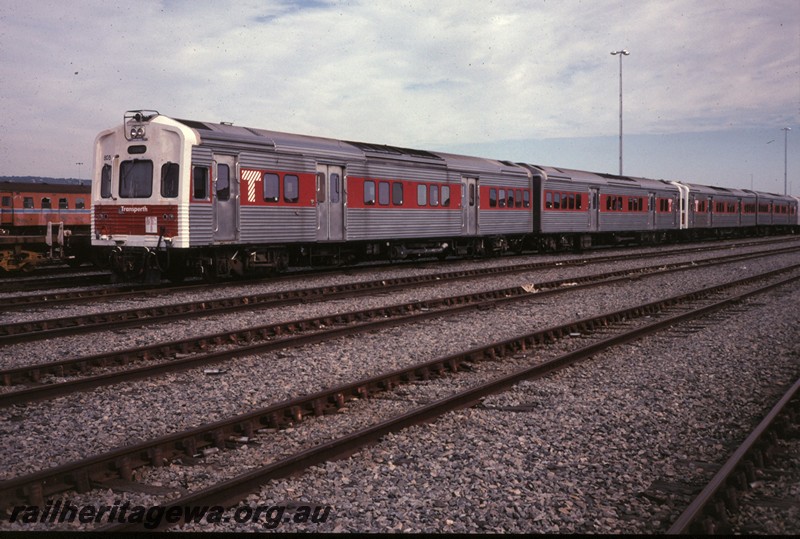 P12844
ADL class railcar sets with white fronts and red stripe along the sides, Forrestfield Yard, stowed, front and side view.
