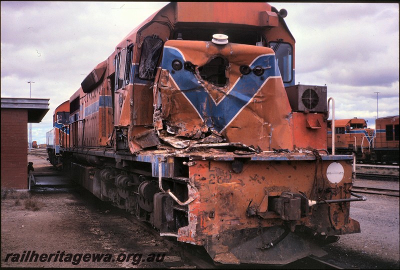 P12856
L class 262, Forrestfield, Yard, front view showing damage from a collision with a truck at Southern Cross.
