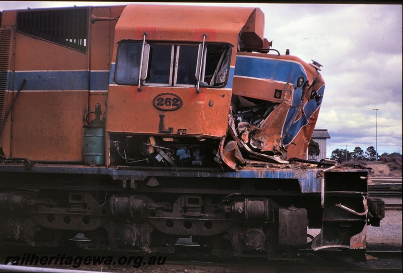 P12857
L class 262, Forrestfield, Yard, side view showing damage to the nose and cab resulting from a collision with a truck at Southern Cross.
