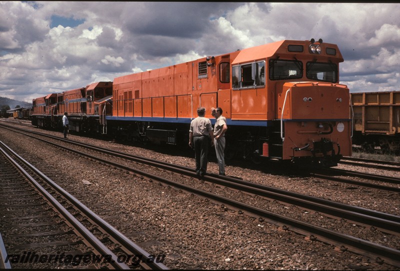 P12858
P class in plain orange livery unlettered and not numbered, coupled to two DB classes, Midland, side and front view
