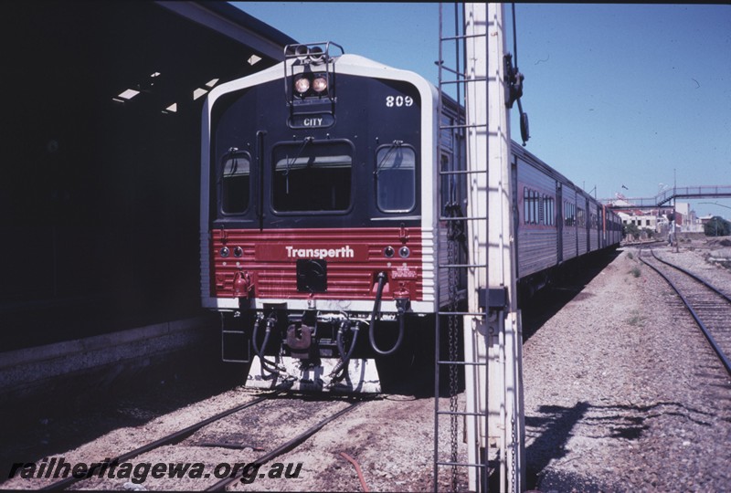 P12860
ADL class 809 railcar set with red and black front, Fremantle front and side view.
