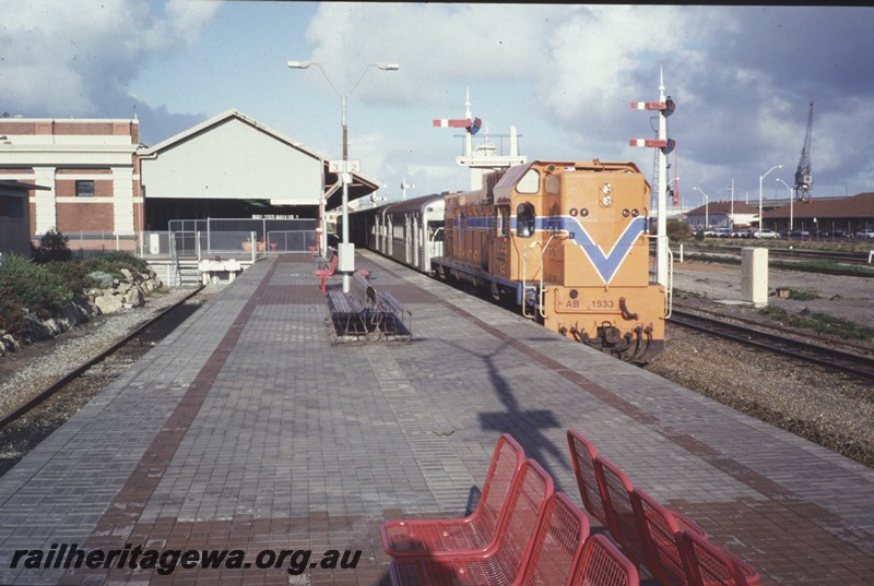 P12907
AB class 1533 hauling the QR carriages, station building, signals, Fremantle, side and front view.
