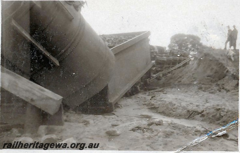 P12929
8 of 8 images of a derailment at Dumberning, BN line, a derailed JA class water tank and the tender of the F class loco. Date of derailment 14/3/1934

