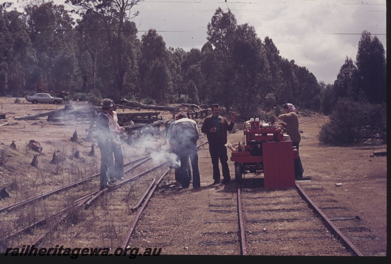 P12963
Motorized ganger's trolley, yard, Chadoora, PN line, group of enthusiasts having a barbeque after having riding the line.
