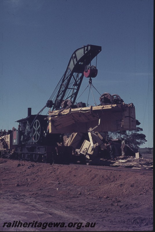 P12968
Steam breakdown crane No.23, Wishbone, WLG line, picking up derailed wagons from No. 54 Goods, side and front view..
