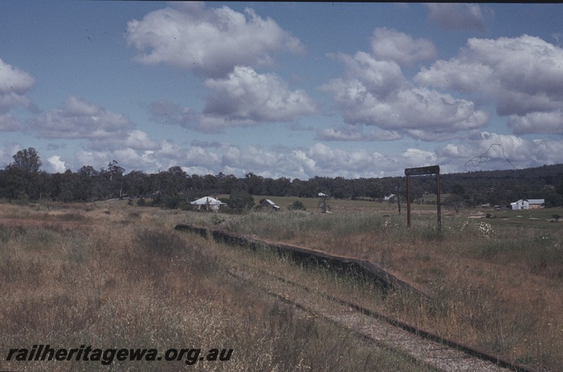 P13020
Platform, nameboard, Bakers Hill, ER line, view looking west of abandoned track
