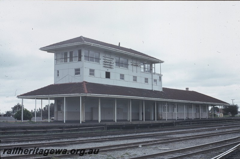 P13033
Station buildings, elevated signal box, Brunswick Junction, SWR line, south end side view.
