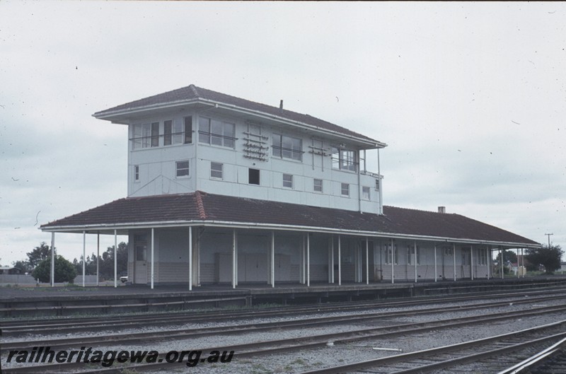 P13033
Station buildings, elevated signal box, Brunswick Junction, SWR line, south end side view.
