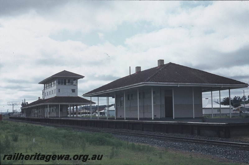 P13037
Station buildings, elevated signal box, Brunswick Junction, SWR line, west side and south end view.

