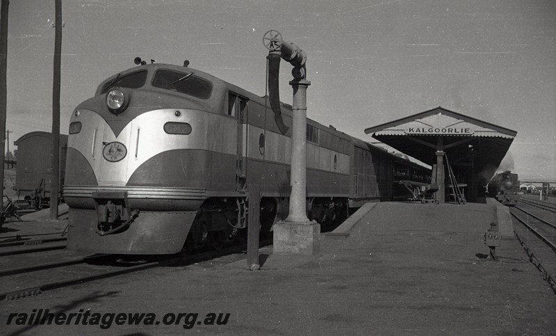 P13050
Commonwealth Railways (CR) GM class 2, water column, station building, Kalgoorlie, EGR line, front and side view. on the 