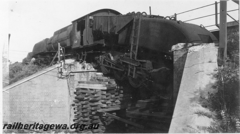 P13098
ASG class 26 hanging over the Davies Road subway, Claremont, pigsty built under the rear tank, view looking towards the loco, accident occurred on 12.9.1944
