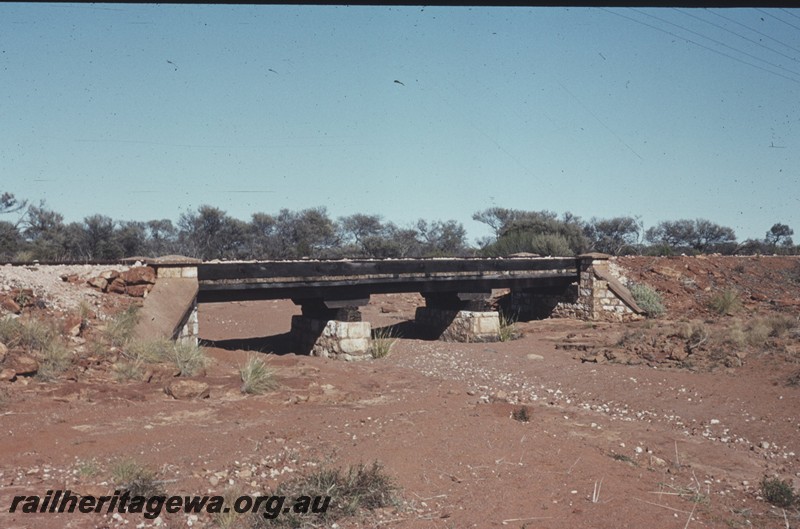 P13120
Timber bridge with stone (masonry) abutments and supports, near Edah siding, side view, NR line
