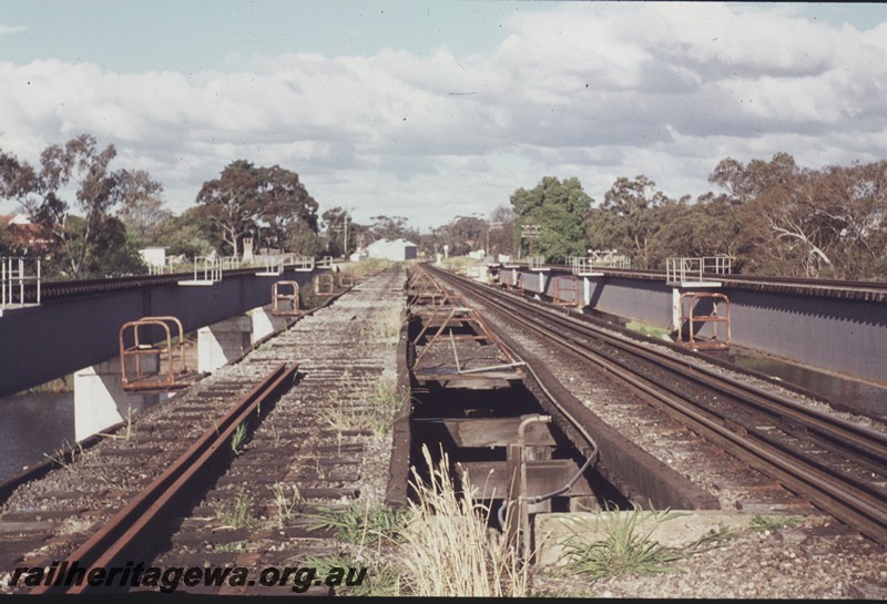 P13129
Trestle bridge, steel girder bridges, Guildford, track having been lifted from the left hand trestle bridge, view along the bridges looking east.
