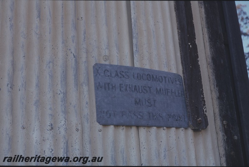 P13146
7 of 7 views of the abandoned, dilapidated and overgrown station at Grass Valley, EGR line, view shows the sign on the goods shed door 