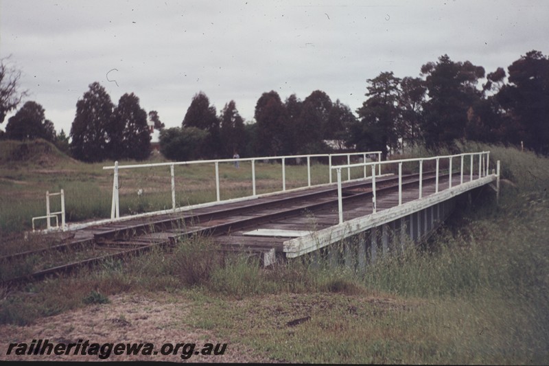 P13156
Turntable, Katanning, GSR line, pit overgrown with weeds, this 80 foot turntable is currently in the ownership of the Hotham Valley Railway at Pinjarra
