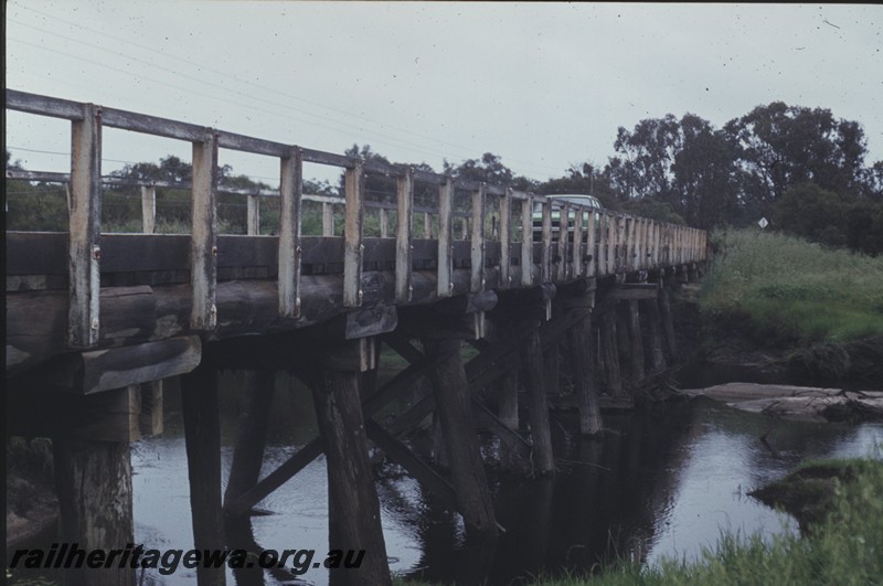 P13184
Trestle bridge over the Harvey River on the abandoned Waroona to Lake Clifton Railway, WLC line, view along the bridge.
