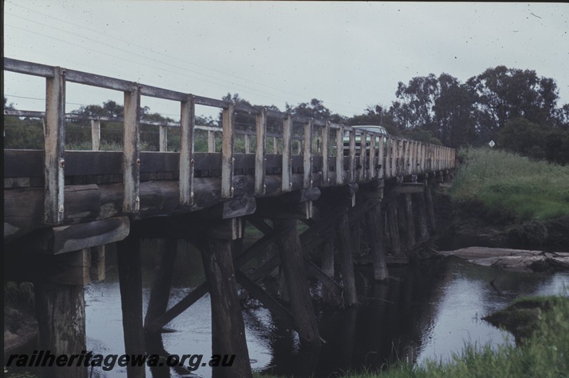 P13184
Trestle bridge over the Harvey River on the abandoned Waroona to Lake Clifton Railway, WLC line, view along the bridge.
