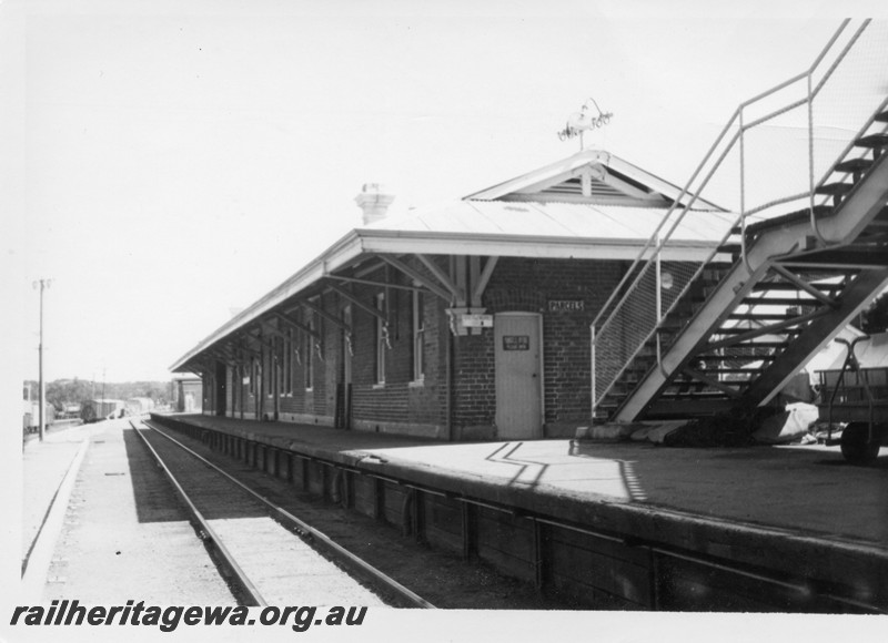 P13210
Station building, Narrogin, GSR line, view along the line looking south. view from footbridge looking west.
