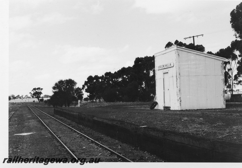 P13239
Out of shed with nameboard, Greenhills, YB line, front and side view of shed.
