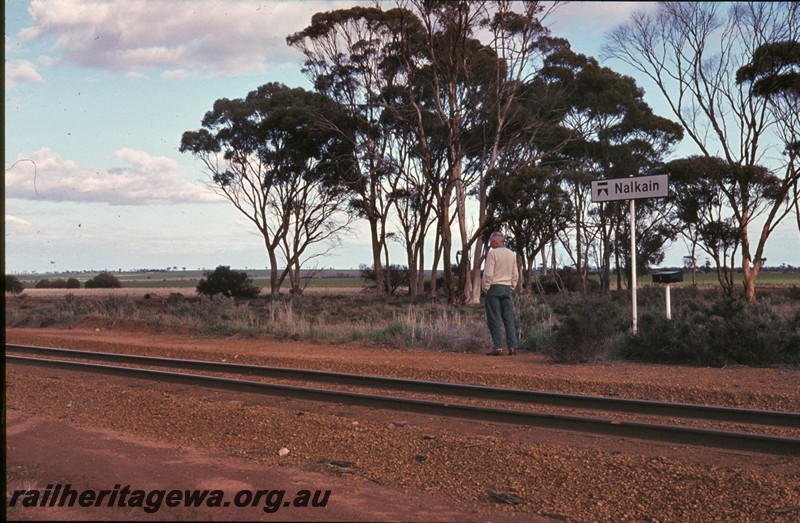 P13285
Siding nameboard, Nalkain, WLB line, view across the line.
