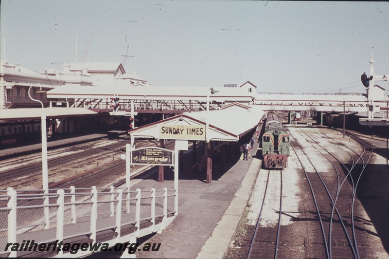 P13300
F class 40. Perth Station, on tour train, view from the Barrack Street Bridge looking along the train.
