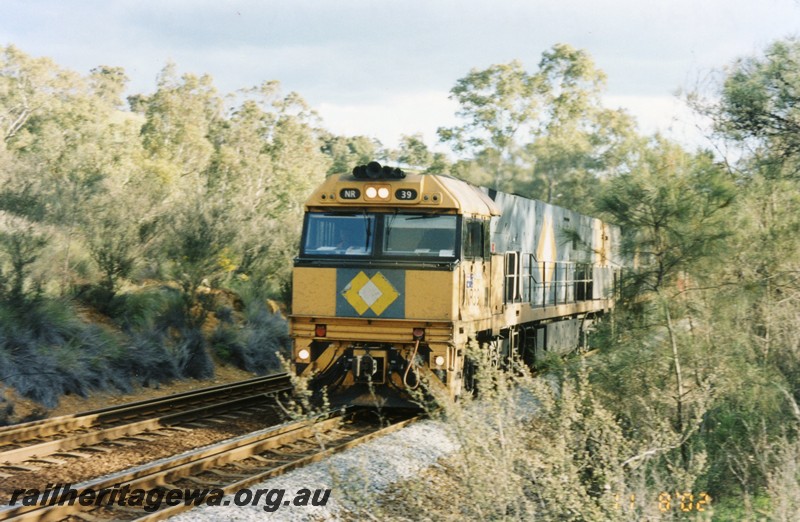 P13324
NR class 39, west bound standard gauge freight, Brigadoon,  front and side view
