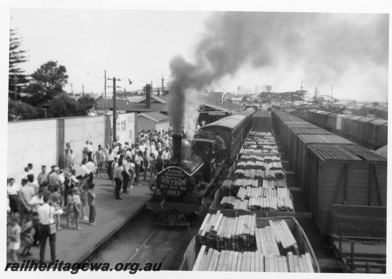 P13349
G class 112,open wagons with timber loads, Bunbury, large crowd on the station platform, view along the train, ARHS tour train
