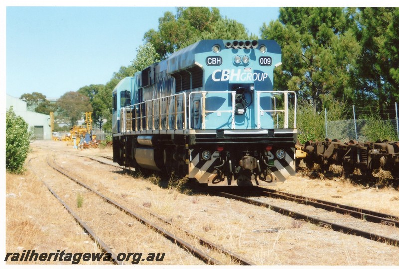 P13354
CBH Group CBH class 009, on track leading to UGL's plant, Bassendean, awaiting repairs after a mishap
