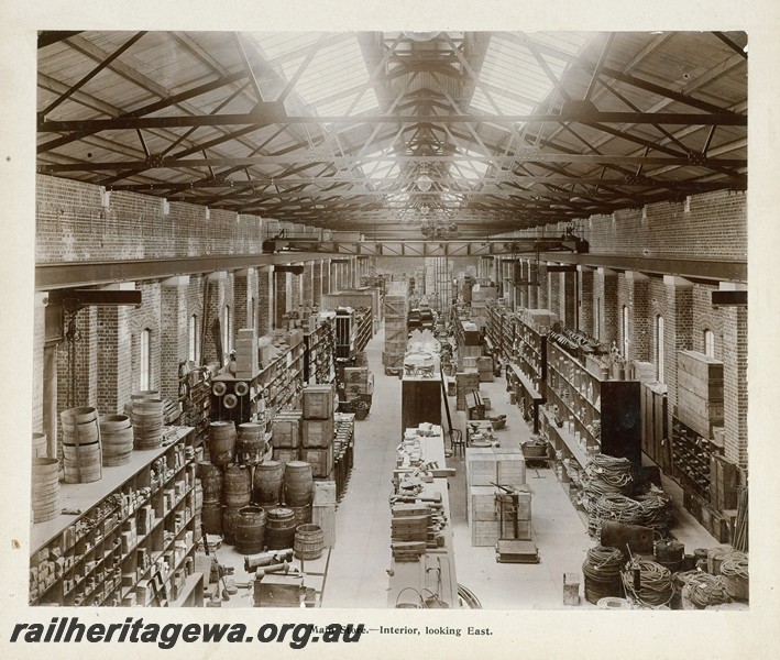 P13410
54 of 67 views taken from an album of photos of the Midland Workshops c1905. Main Store, - Interior, Looking East.
