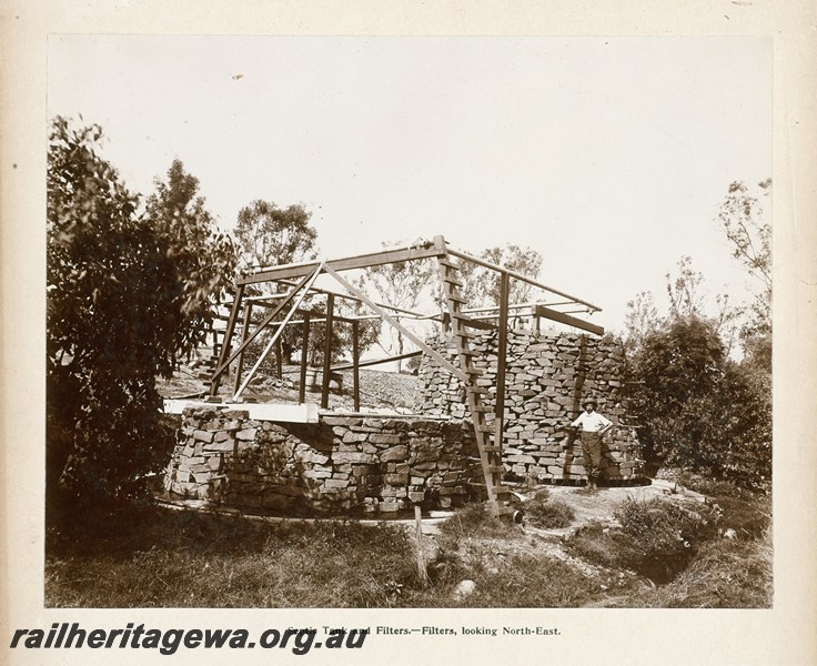 P13423
67 of 67 views taken from an album of photos of the Midland Workshops c1905. Septic tank and Filters, - Filters, Looking North East.
