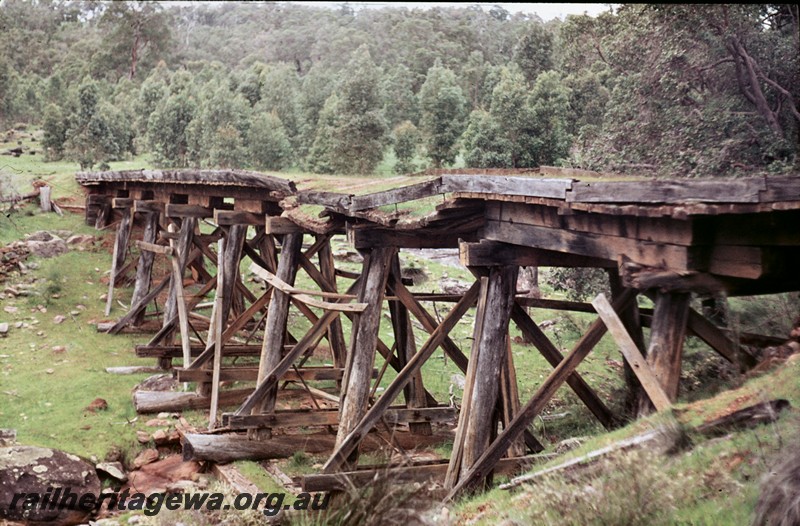 P13463
Trestle bridge, abandoned and derelict on Millars Zig Zag near Yarloop, view along the bridge.
