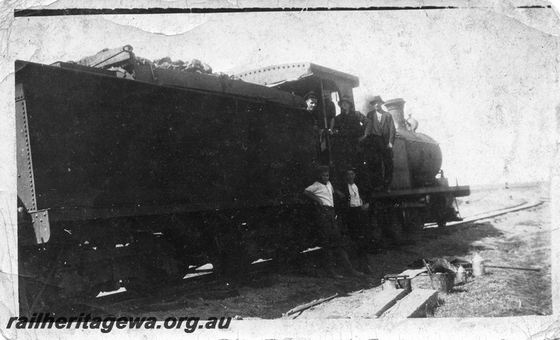 P13507
2 of 7 images of O class 91, date and location Unknown, view looking forward of the side of the loco, crew on the running board
