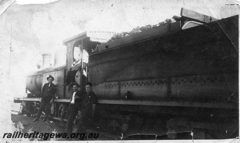 P13508
3 of 7 images of O class 91, date and location Unknown, view looking forward of the side of the loco, crew in front of the cab, 
