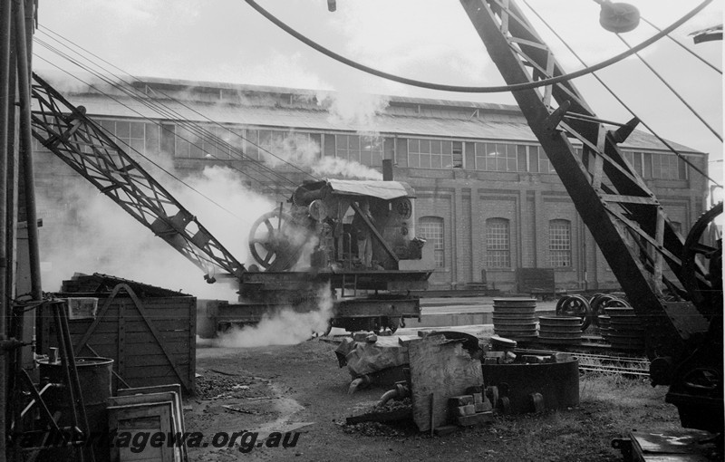 P13515
1 of 6 images of steam crane No.27, Midland Workshops, in steam, front and side view
