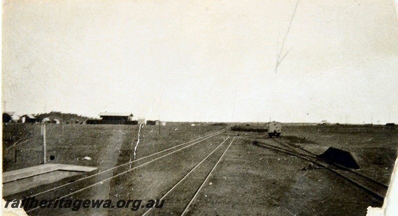P13560
5 of 6 images of the station buildings and yard at Meekatharra, NR line, view looking north down the yard
