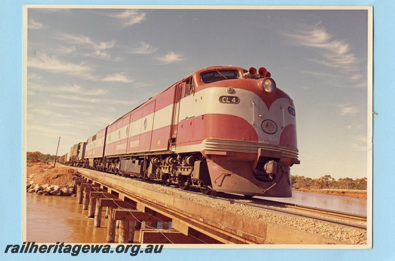 P13577
Commonwealth Railways (CR) CL class 4 on a freight train crossing the Zanthus Bridge, TAR Line, side and front view
