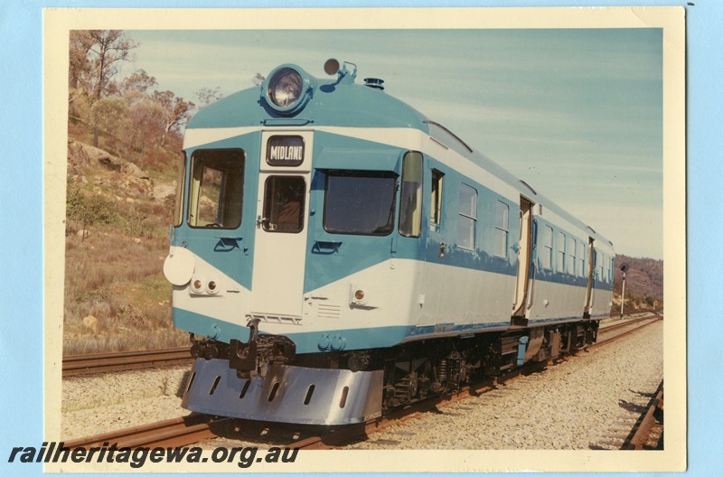 P13579
ADX class 670 in experimental blue livery, front view and side view.
