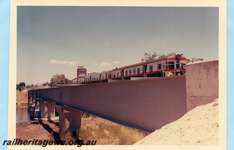 P13595
ADX class heading a four car railcar set, steel girder bridge, Guildford, looking towards Perth.
