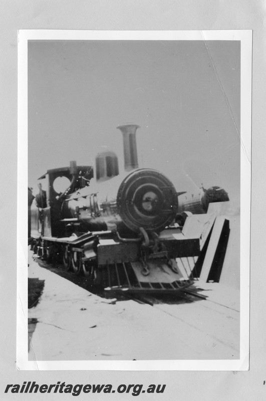 P13637
Bunnings loco 128, purchased from Queensland in 1950 still retaining its standard QR smokebox door, side and front view.
