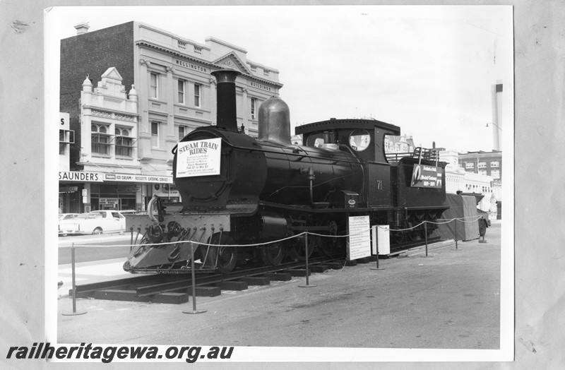 P13642
G class 71 on display on the Perth Station forecourt, front and side view
