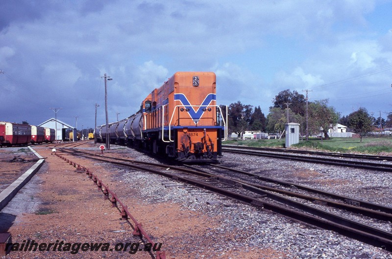 P13687
NA class 1874, Pinjarra, SWR line, stabled narrow gauge alumina train.
