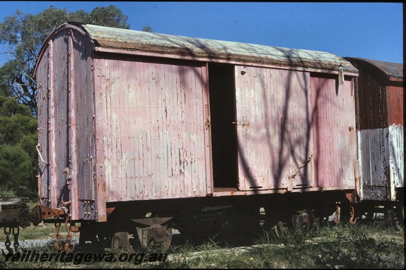 P13770
2 of 9 views of the abandoned and derelict D class, DA class and DE class vans at the Woodman Point munitions depot, DE class van, end and side view
