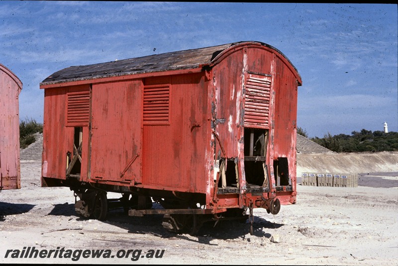 P13776
8 of 9 views of the abandoned and derelict D class, DA class and DE class vans at the Woodman Point munitions depot, DA class 10956, side and end view.
