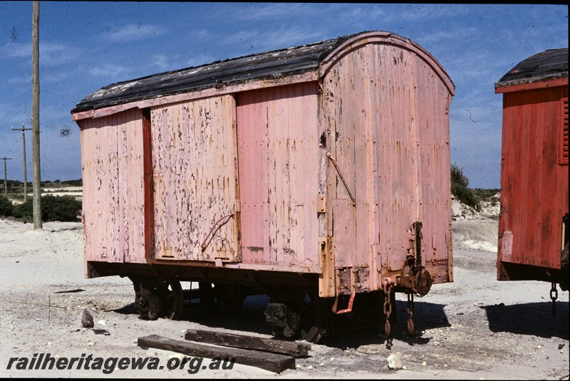 P13777
9 of 9 views of the abandoned and derelict D class, DA class and DE class vans at the Woodman Point munitions depot, DE class 61, side and end view.
