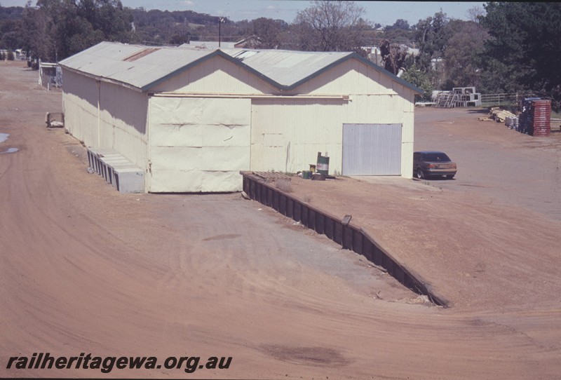 P13850
Goods shed, loading platform, Narrogin, GSR line, no longer served by rail, elevated view form the footbridge.
