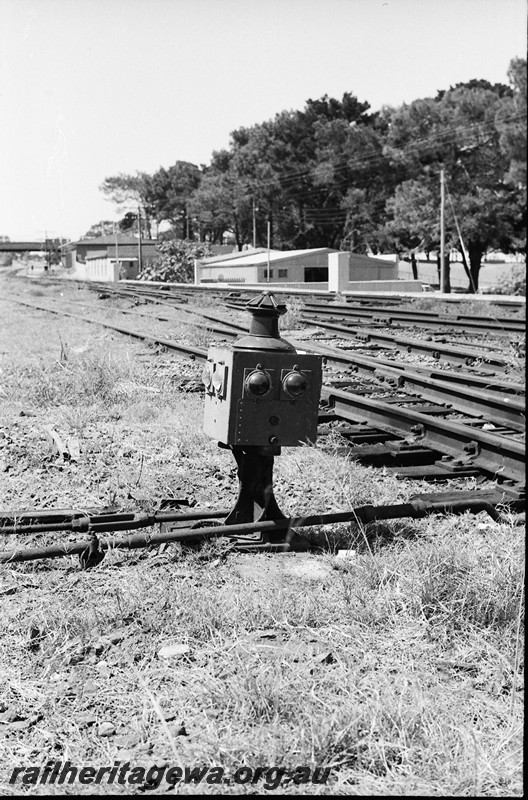 P13890
Point indicator with square faces and oil lamp, Subiaco
