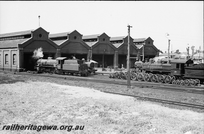 P13981
12 of 17 images of locos, trains and buildings at the East Perth Loco Depot, W class, N class 201 being used as the steam cleaner, FS class 457 on the apron in front of the loco shed.
