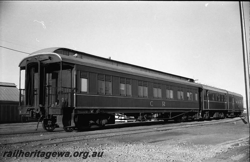 P14004
Commonwealth Railways (CR) wooden sided carriage with a clerestory roof, end and side view.
