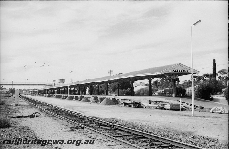 P14014
Station platform, nameboard, Kalgoorlie, ERG line, view along the platform.
